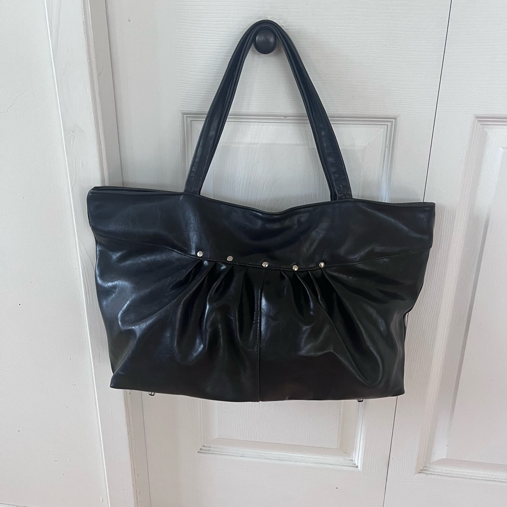 Sleek coated canvas vegan leather tote